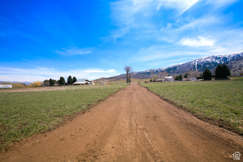 View of street with a mountain view and a rural view