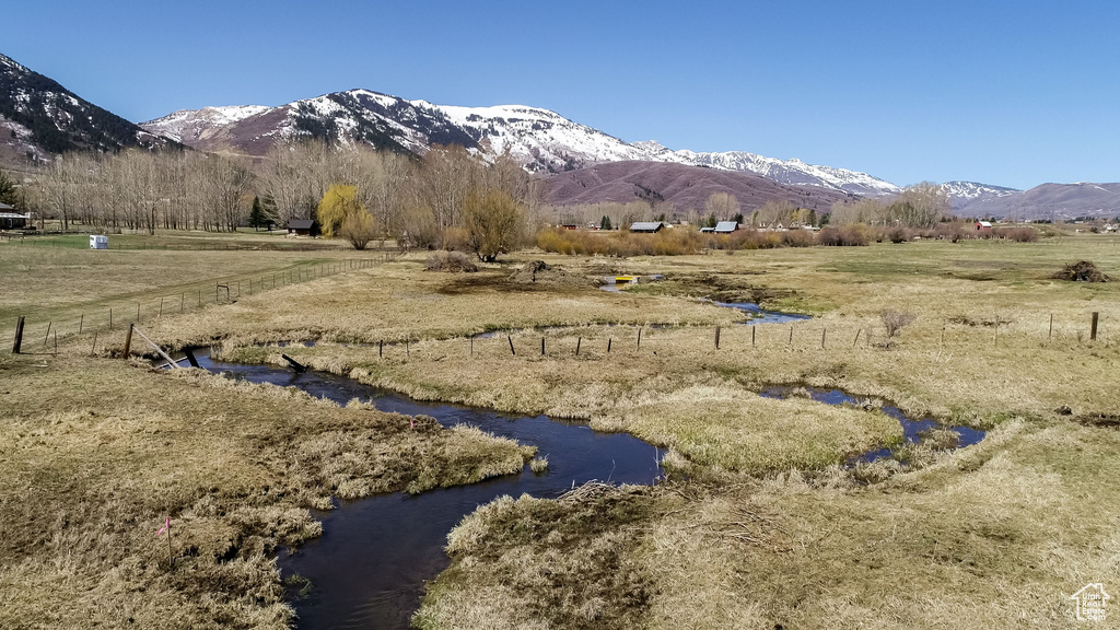 Property view of mountains featuring a rural view