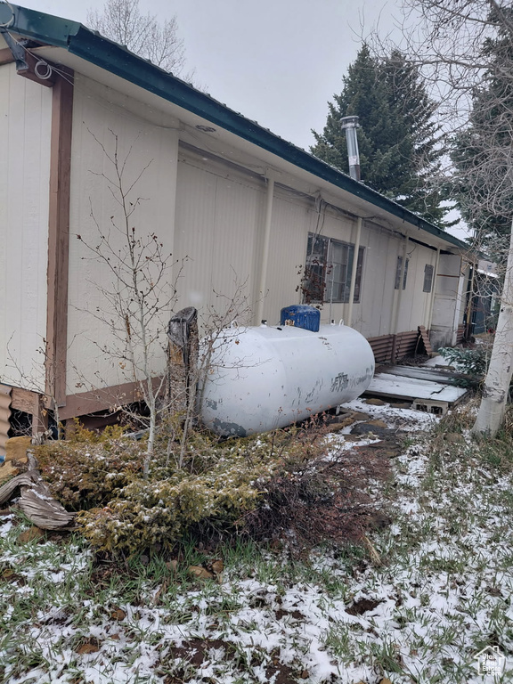 View of snow covered property