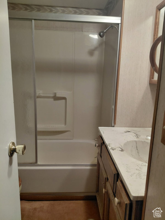 Full bathroom featuring vanity and  shower combination