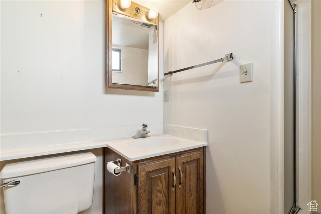 Bathroom featuring toilet and vanity