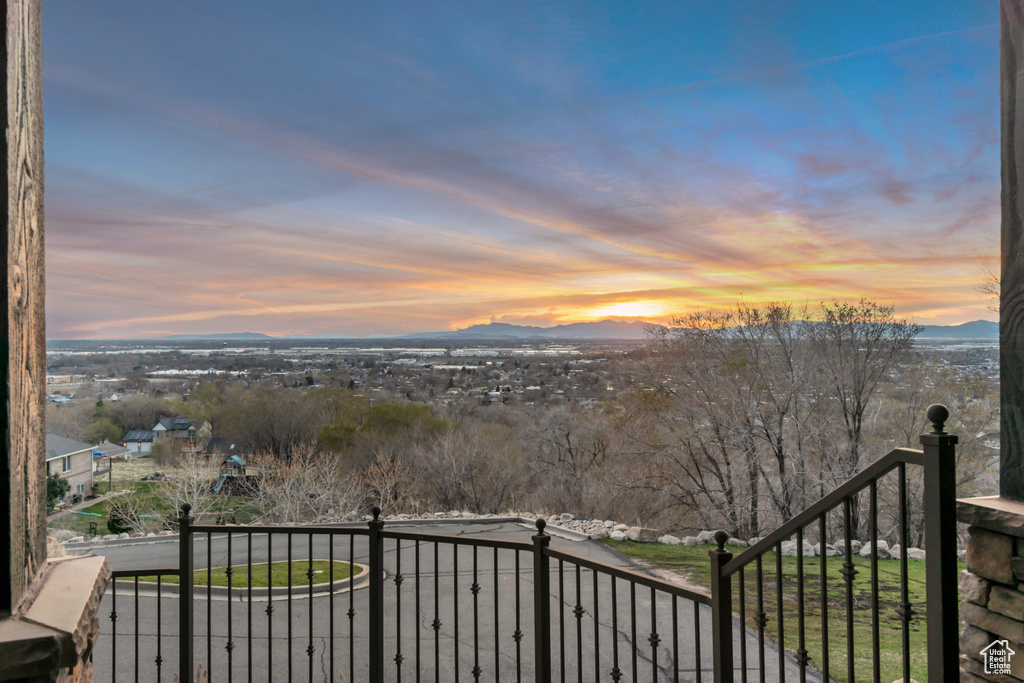 Balcony at dusk with a mountain view