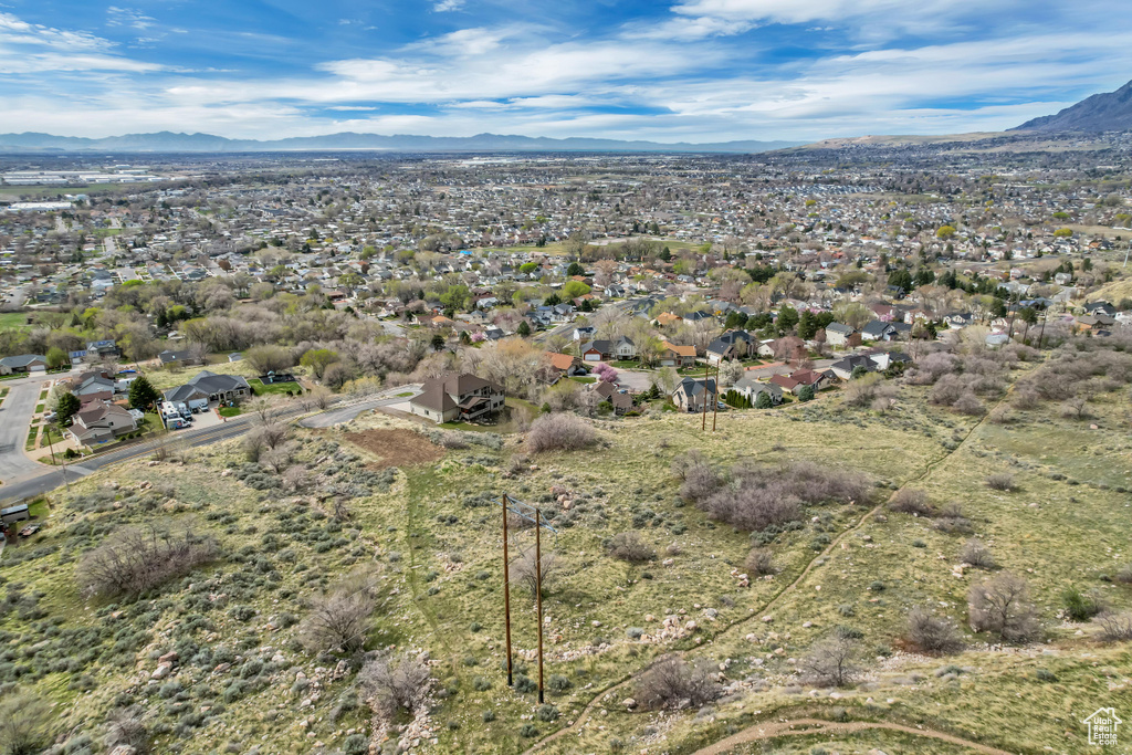 Aerial view featuring a residential view and a mountain view