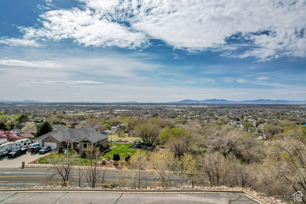 Birds eye view of property with a mountain view
