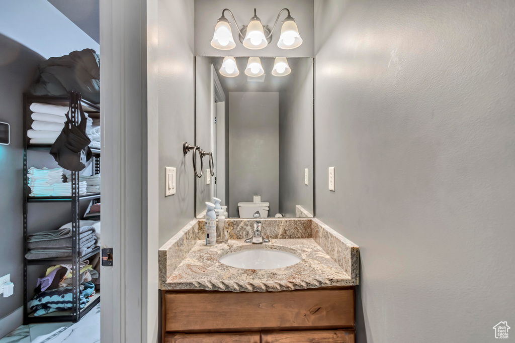 Half bath with toilet and vanity