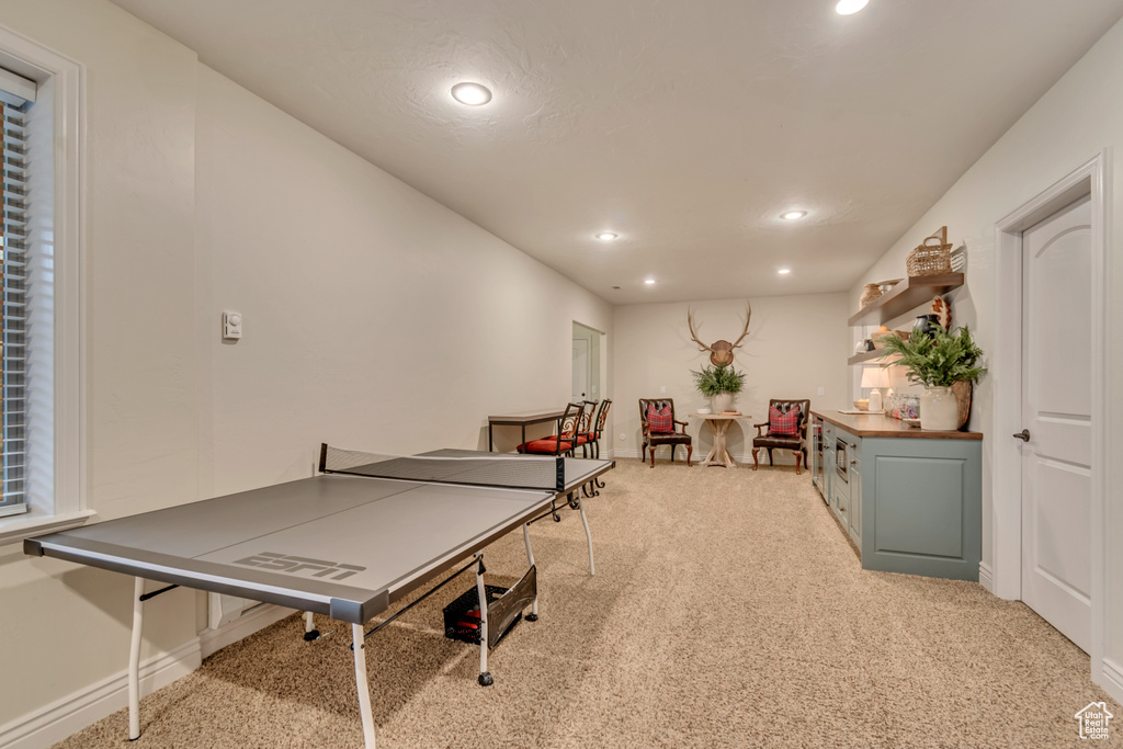 Playroom featuring light carpet, baseboards, and recessed lighting