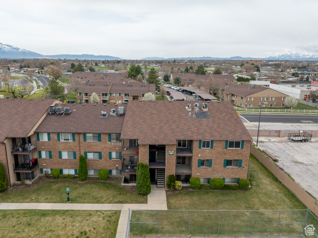 Aerial view featuring a mountain view and a residential view