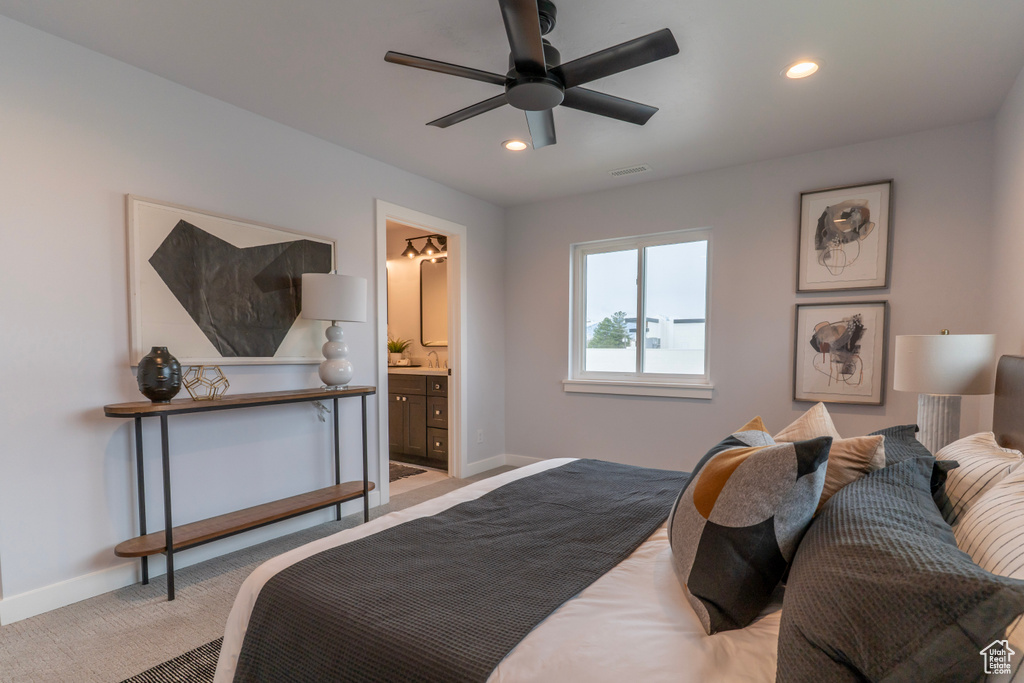 Bedroom featuring visible vents, baseboards, connected bathroom, recessed lighting, and light carpet