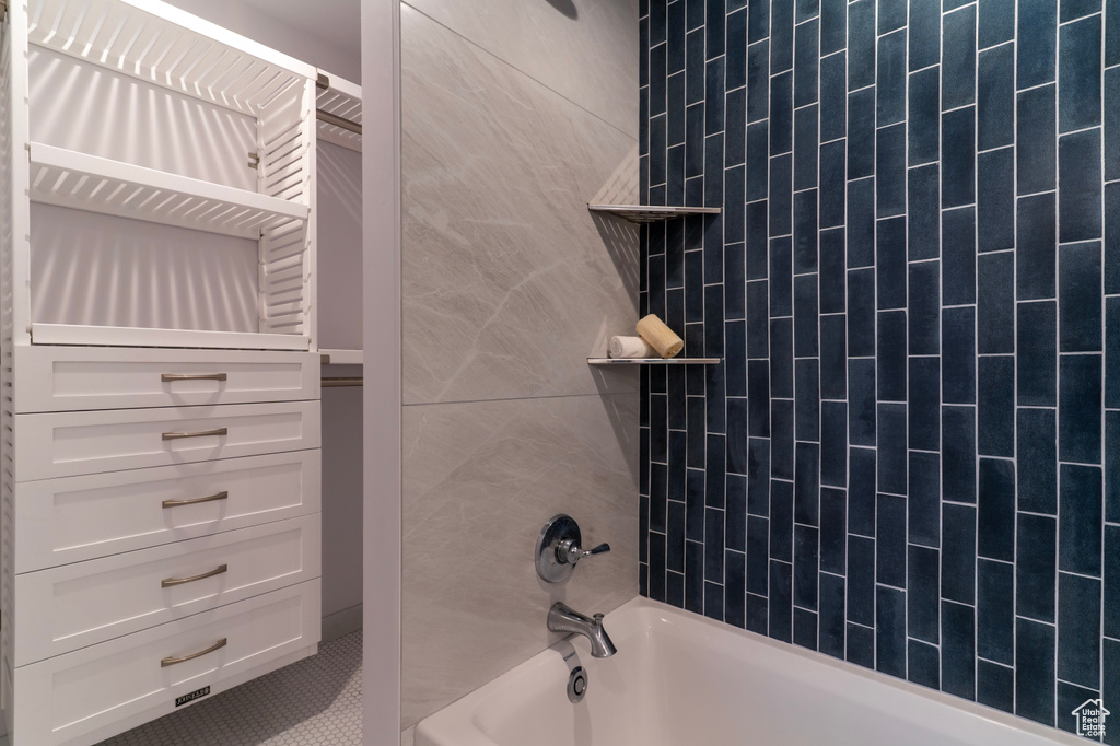 Bathroom featuring bathing tub / shower combination