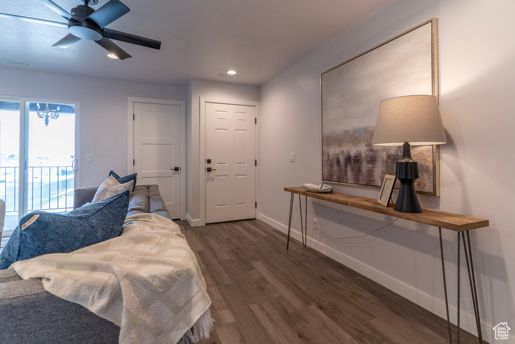 Bedroom with visible vents, baseboards, recessed lighting, dark wood finished floors, and access to exterior