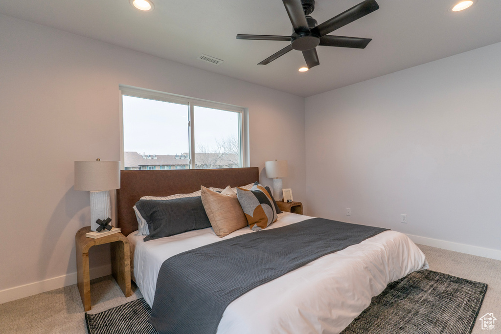 Bedroom with baseboards, visible vents, and recessed lighting
