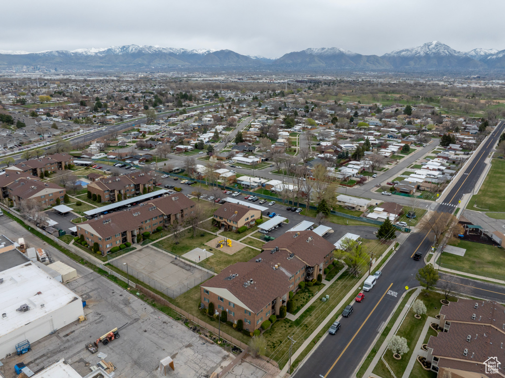 Drone / aerial view with a residential view and a mountain view