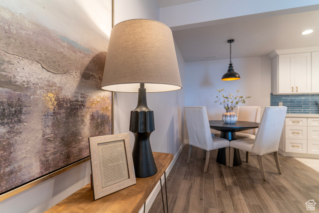 Dining room featuring recessed lighting and light wood-type flooring