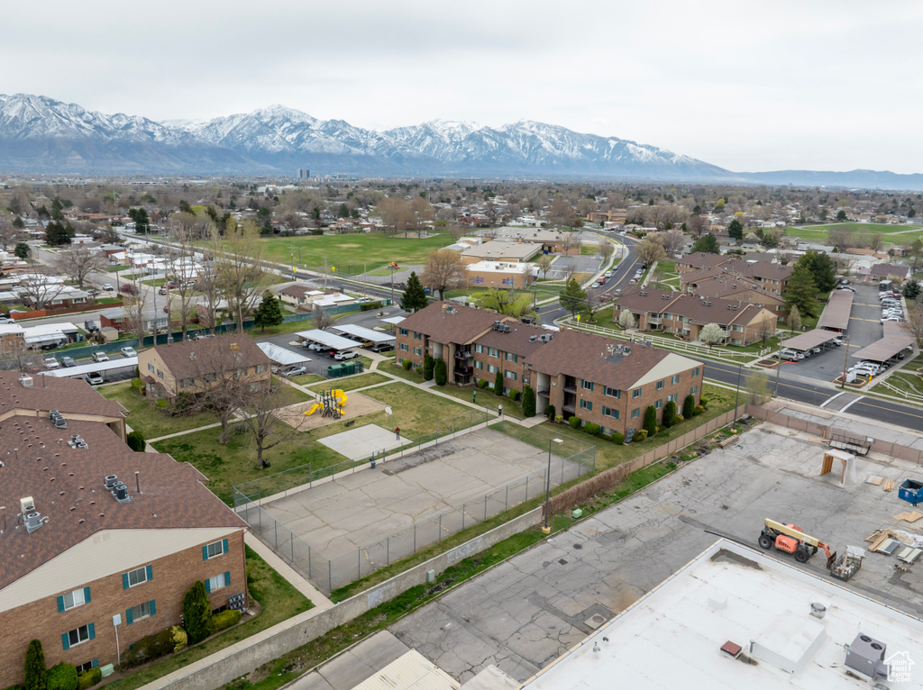 Birds eye view of property featuring a mountain view and a residential view