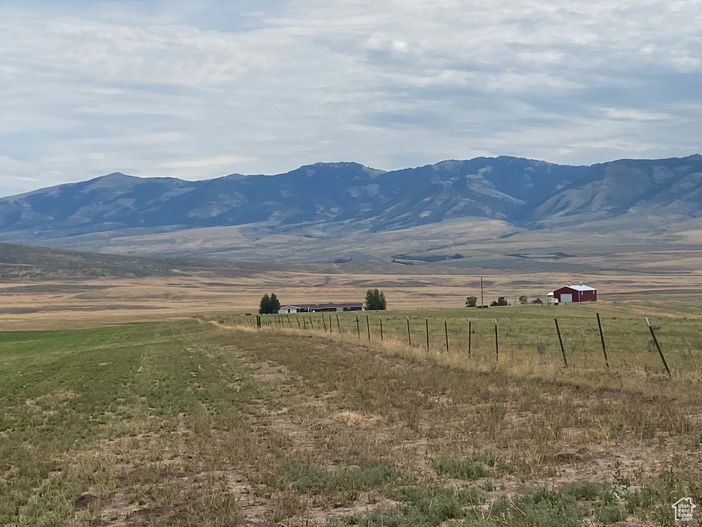 Property view of mountains featuring a rural view
