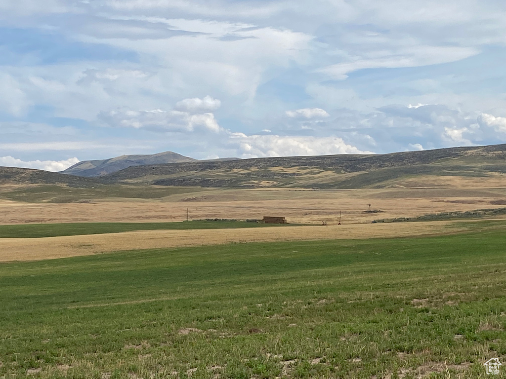 Property view of mountains with a rural view