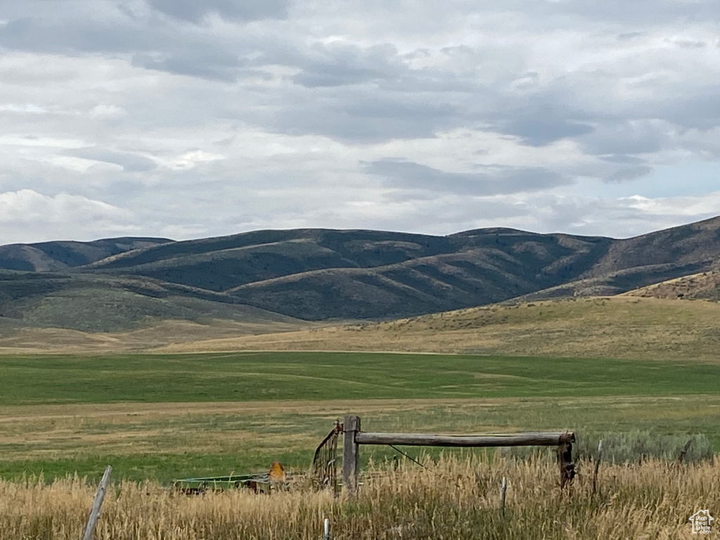 Property view of mountains with a rural view