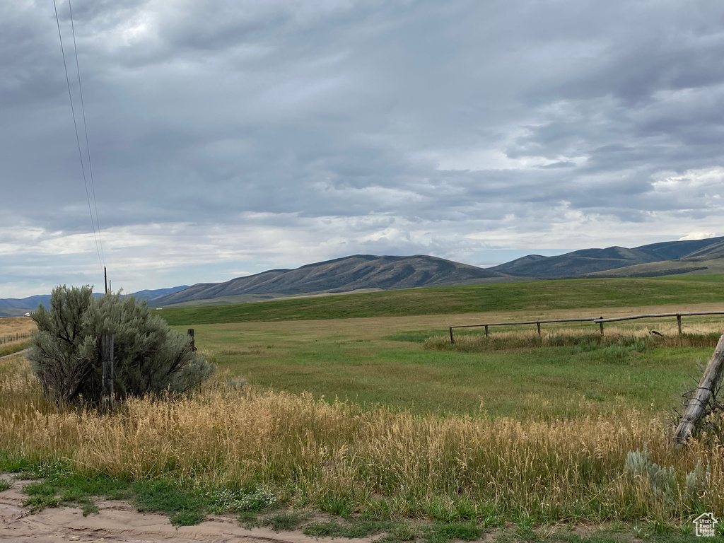 Property view of mountains featuring a rural view