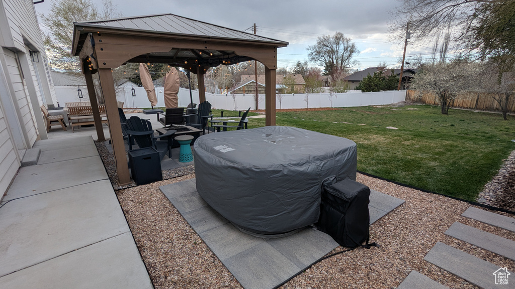 View of patio / terrace with a fenced backyard, a gazebo, and area for grilling