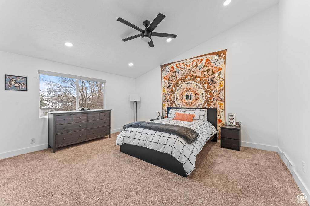 Carpeted bedroom featuring a ceiling fan, baseboards, vaulted ceiling, and recessed lighting