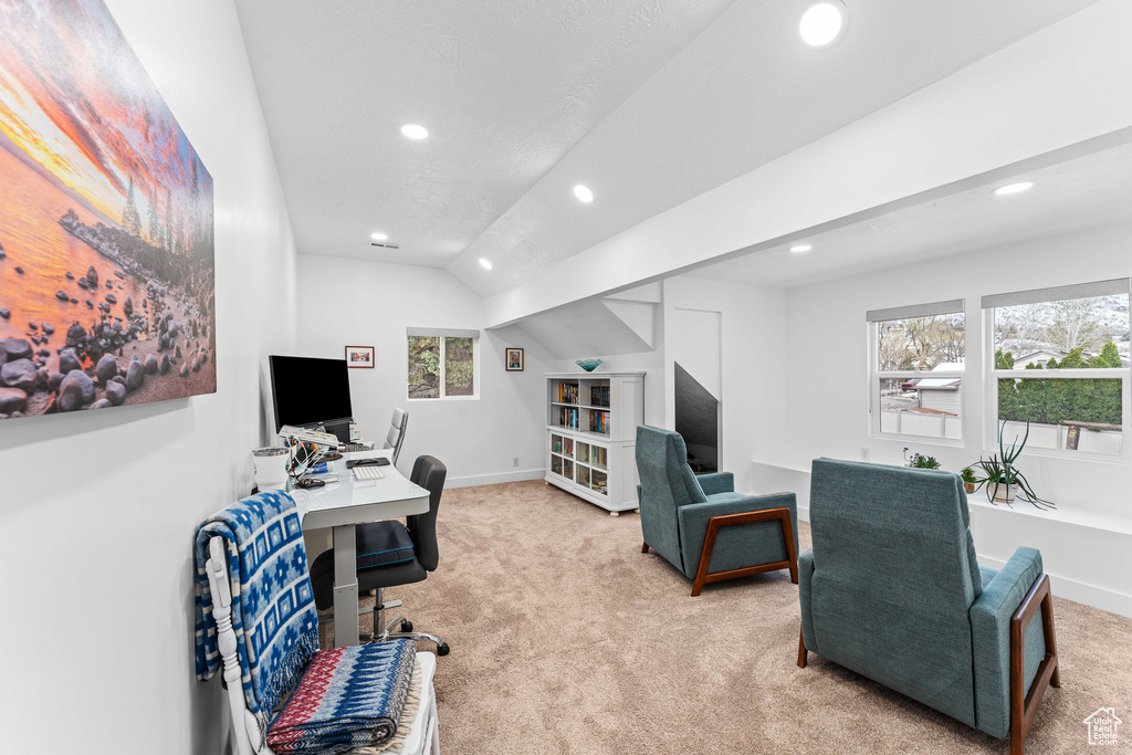 Carpeted home office featuring baseboards, recessed lighting, and a healthy amount of sunlight