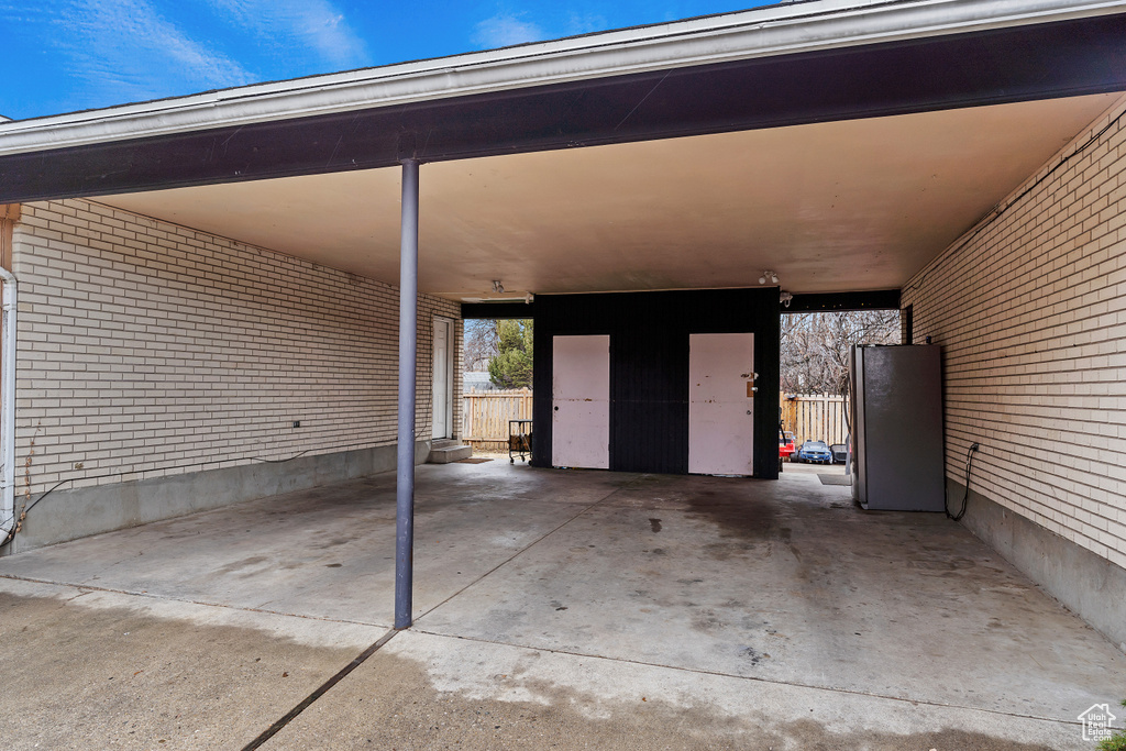 Exterior space featuring a carport