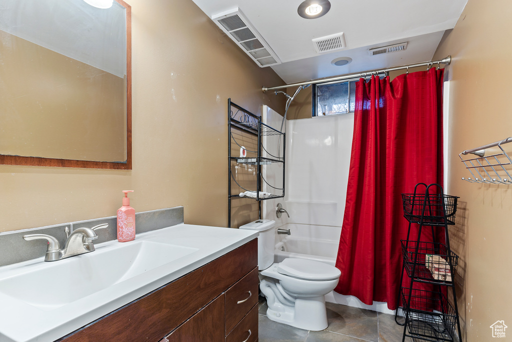 Full bath featuring shower / bath combination with curtain, visible vents, toilet, and vanity