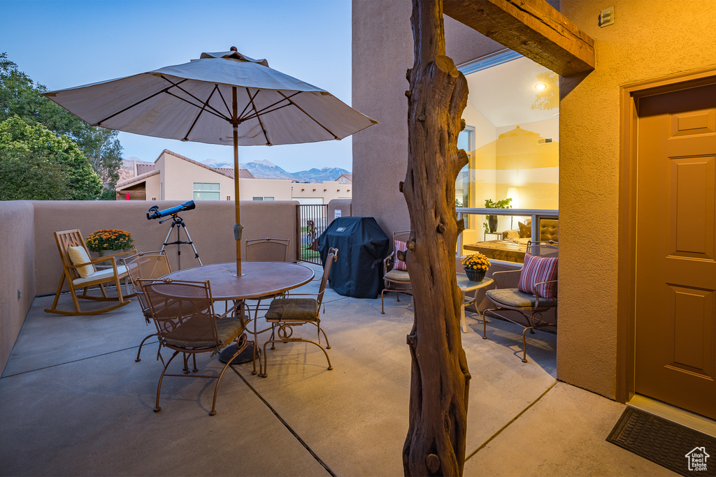 View of patio featuring a mountain view and area for grilling