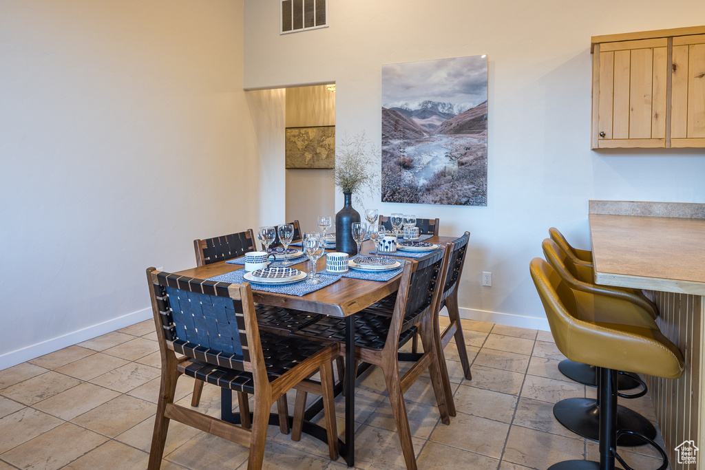 Dining area featuring baseboards and visible vents