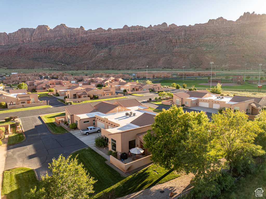 Drone / aerial view featuring a mountain view and a residential view