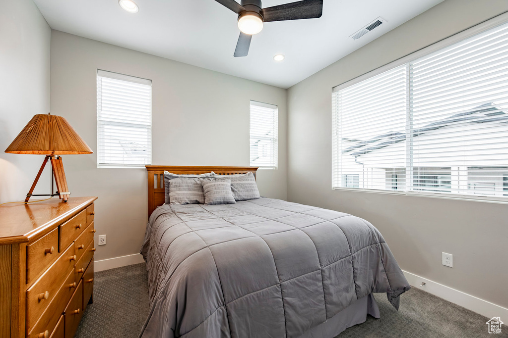 Bedroom with visible vents, a ceiling fan, baseboards, recessed lighting, and carpet flooring