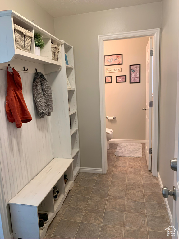 Mudroom featuring baseboards