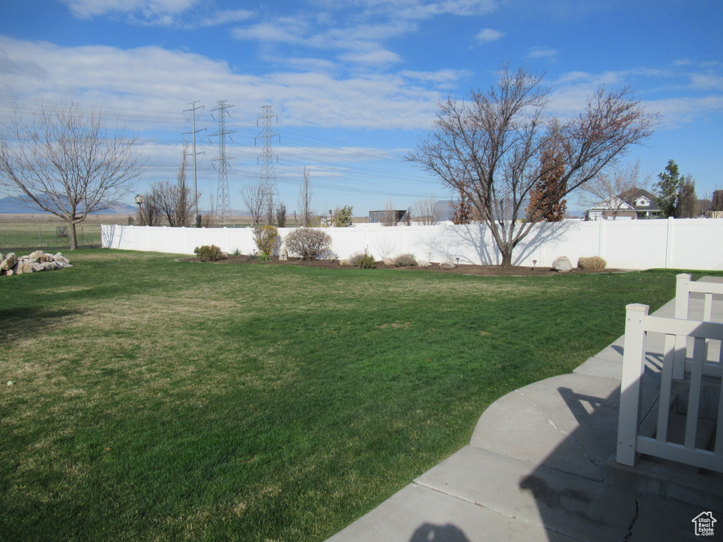 View of yard with a fenced backyard