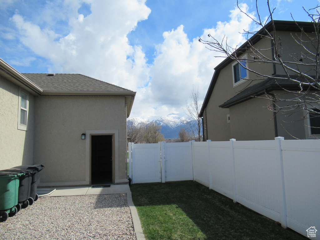 View of yard featuring fence