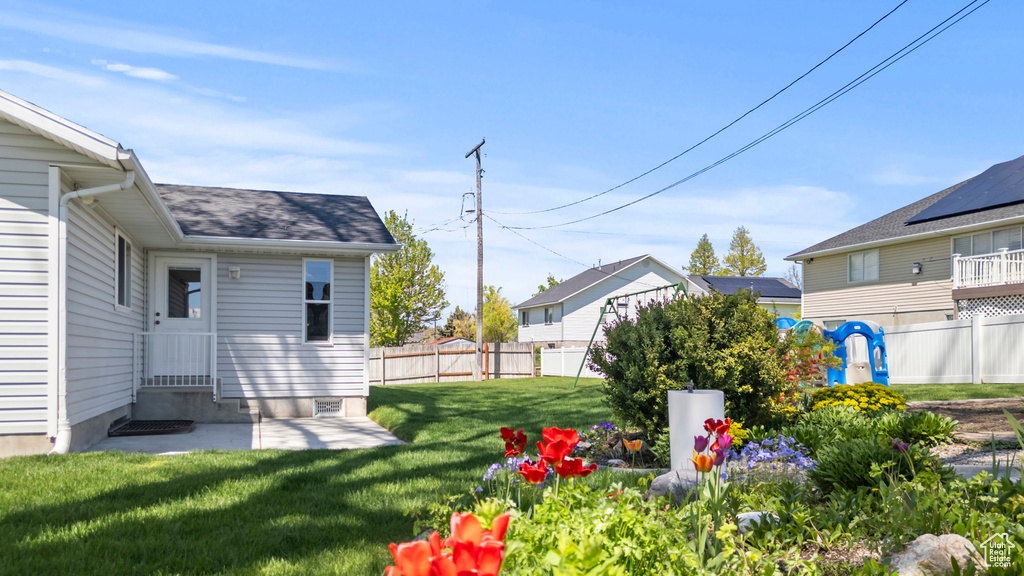 View of yard featuring entry steps
