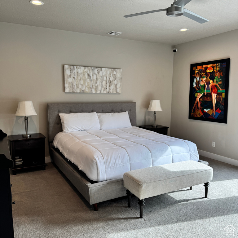 Bedroom with baseboards, carpet floors, visible vents, and recessed lighting