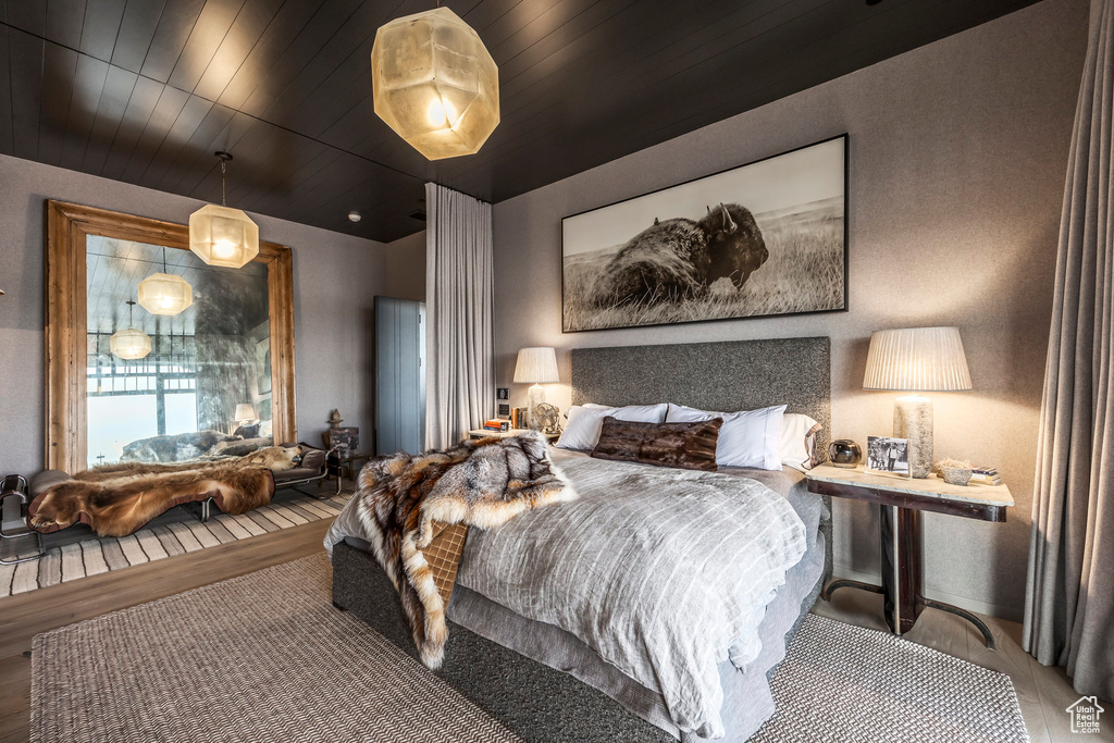 Bedroom with wood finished floors