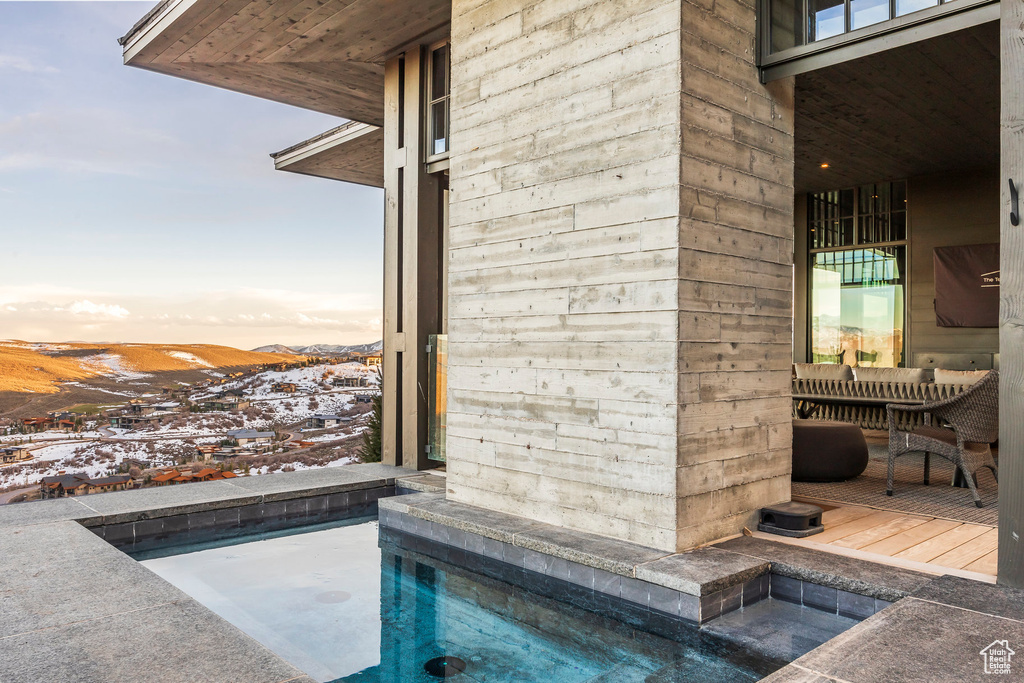View of swimming pool featuring a mountain view