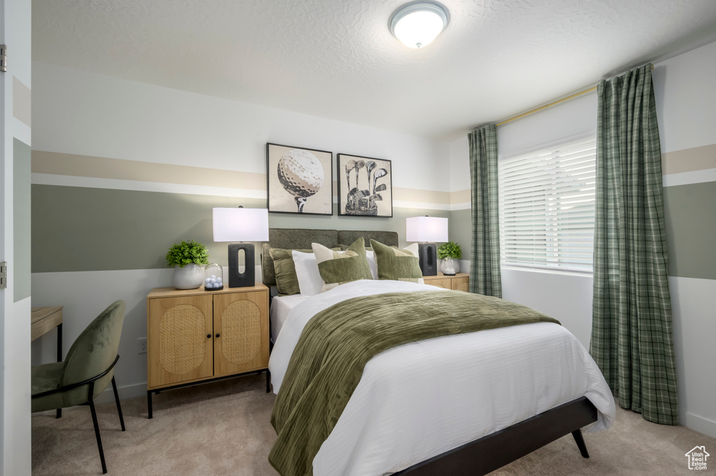 Bedroom featuring carpet
