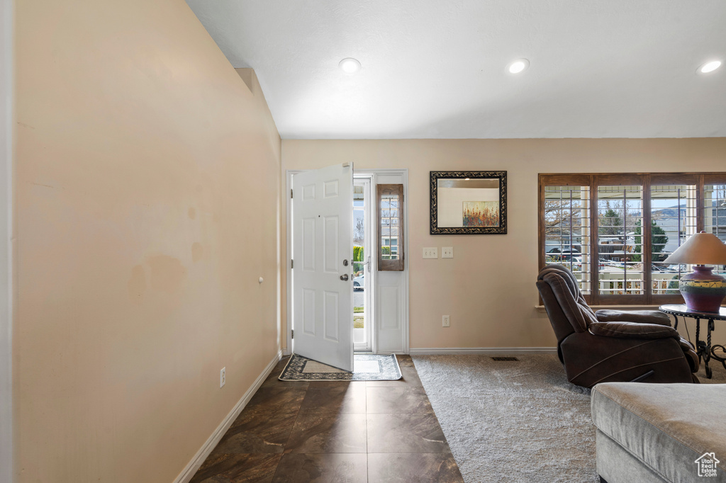 Foyer entrance featuring baseboards and recessed lighting