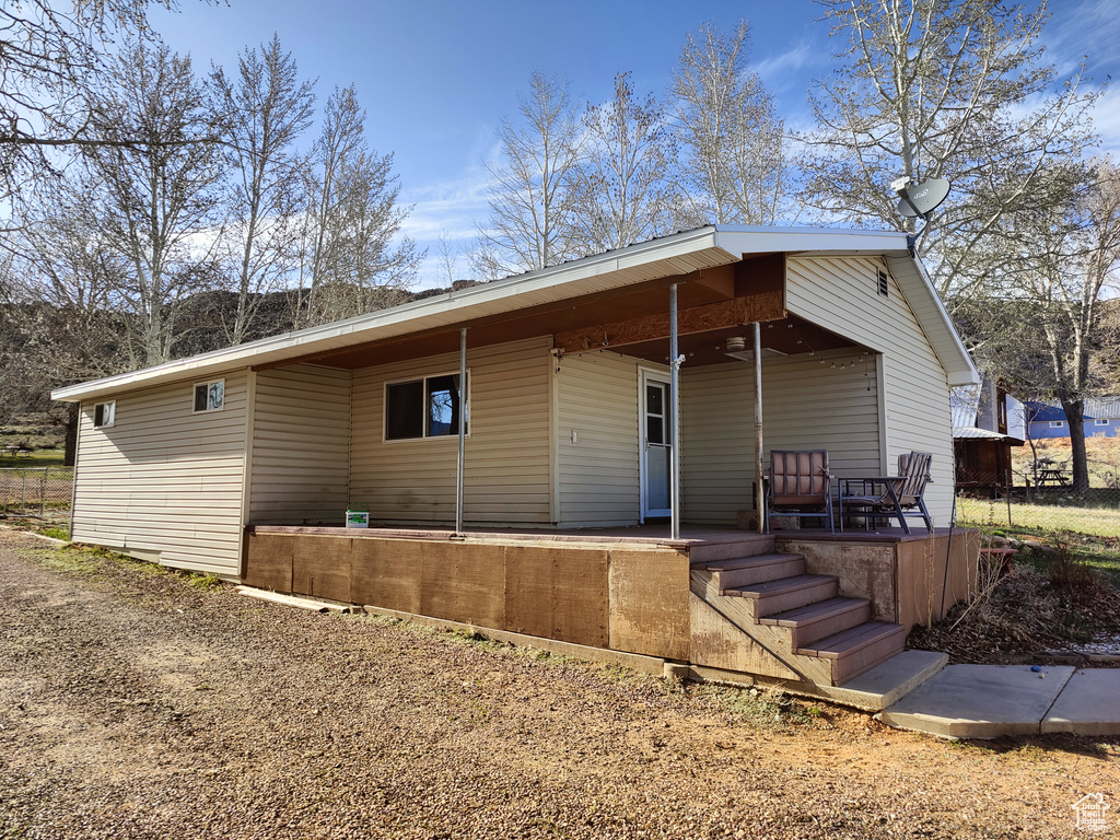 Exterior space featuring covered porch