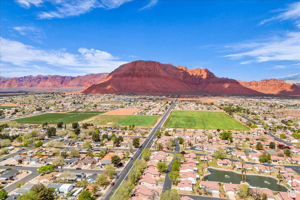 Drone / aerial view featuring a residential view and a water and mountain view