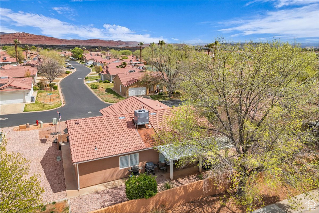 Aerial view featuring a mountain view and a residential view
