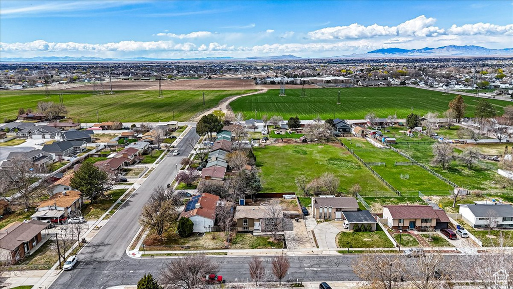 Birds eye view of property featuring a residential view and a mountain view