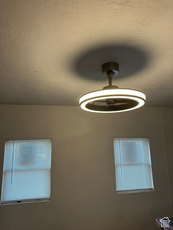 Room details featuring a textured ceiling