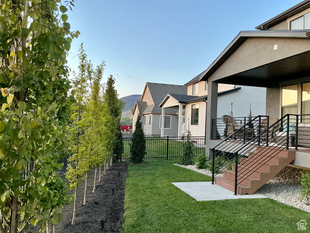 View of yard with fence