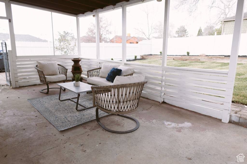 Sunroom featuring a healthy amount of sunlight