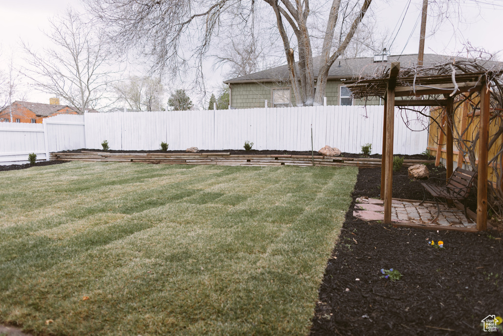 View of yard featuring a fenced backyard