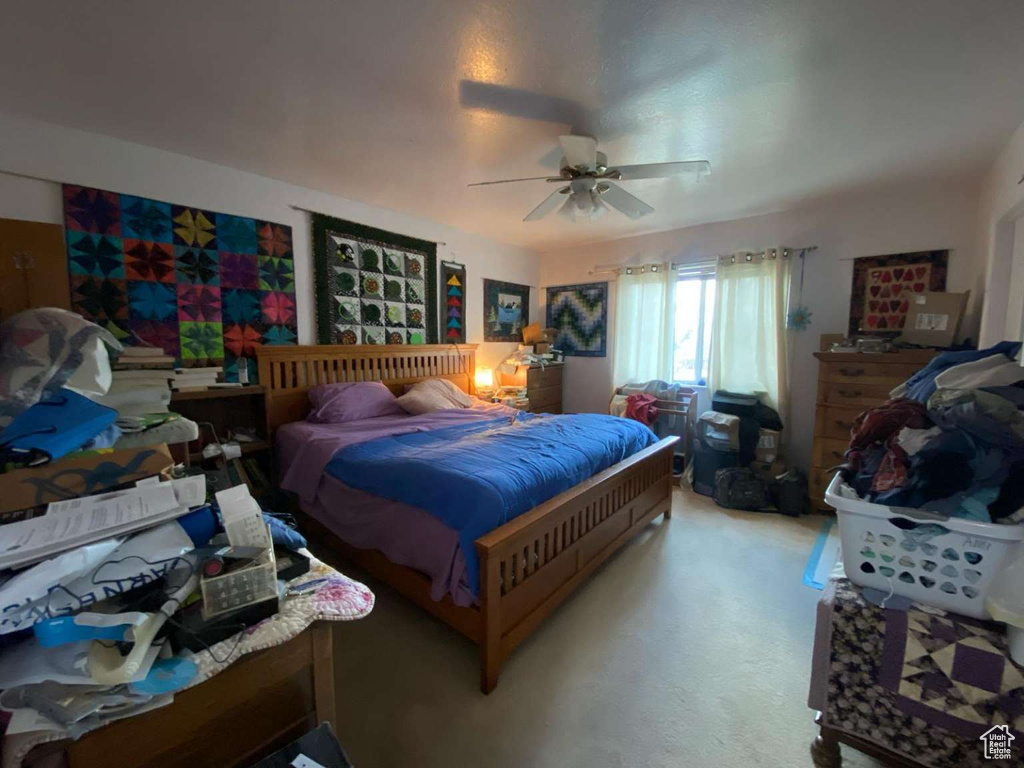 Bedroom with a ceiling fan