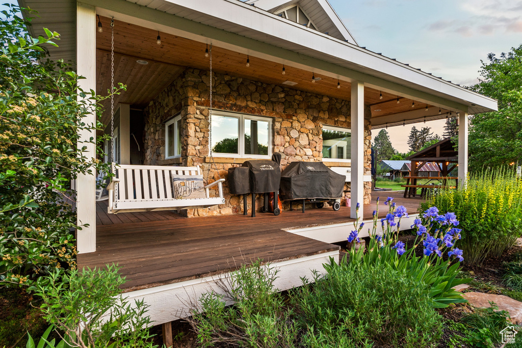 Deck featuring area for grilling